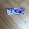 photo du bandeau cheveux fleurs violettes / blanc posé