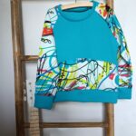 sweat enfant turquoise graffiti