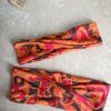 deux bandeaux enfant et adulte assortis orange vintage, posés côte à côté